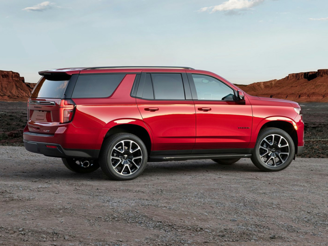 A red Chevrolet Tahoe parked outdoors