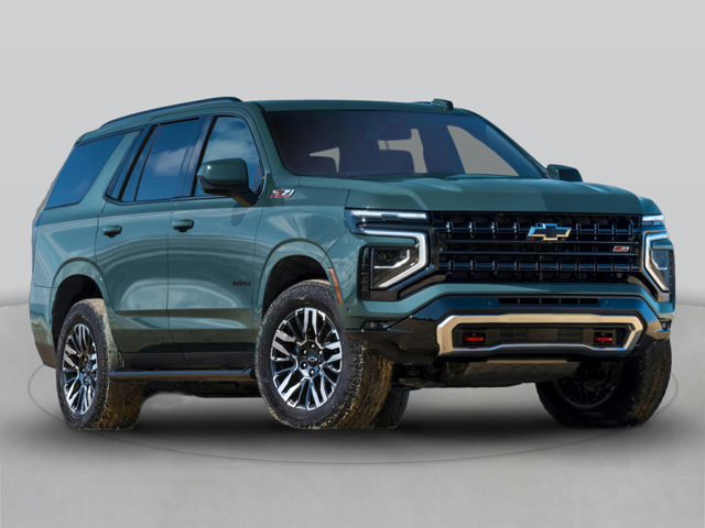 A greenish blue Chevrolet Tahoe